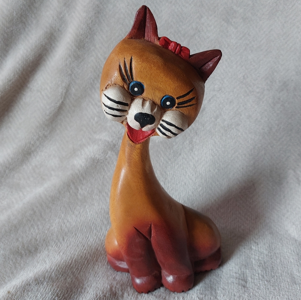 Vintage wooden happy smiling cat
